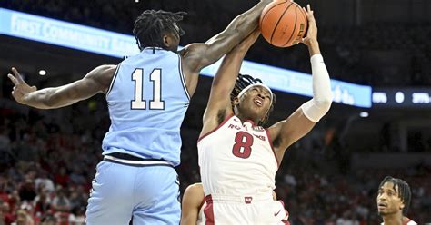 Ellis has big 2nd half as No. 14 Arkansas holds off Old Dominion 86-77